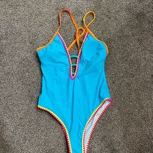 Vibrant Blue One-Piece Swimsuit with Colorful Trim